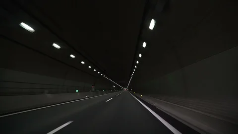 Driving in the dark tunnel Stock Footage 86304655