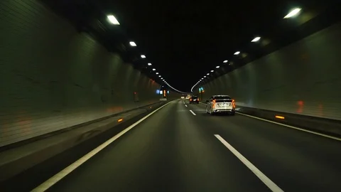 Driving in the dark tunnel Stockbeeldmateriaal 89074543