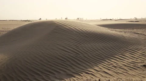 Driving into the Desert with Dunes Stock Footage