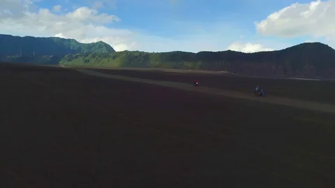 Driving in a desolated area at the Bromo volcano on Java Indonesia Stock Footage 87490850