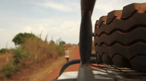 Driving dirt road Uganda 2 Vídeos de archivo 50231659
