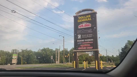 Driving Dollar General Papa Johns Signage Street Stock Footage 246513660