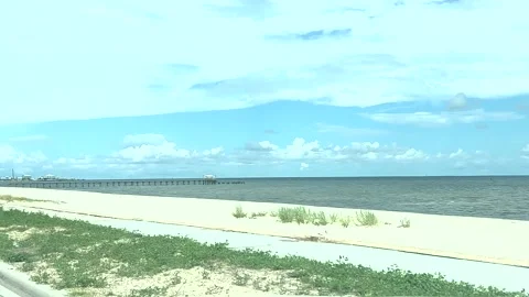 Driving down the beach in 4k 60fps Stock Footage 202742529