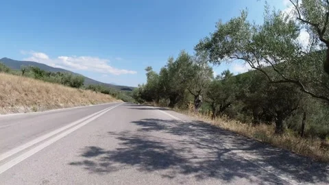 Driving down a beautiful empty mountain highway 스톡 동영상 145955903