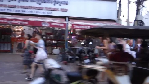 Driving down boulevard Siem Reap Cambodia Stock Footage 83098110