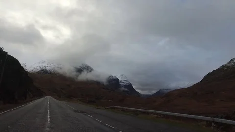 Driving Down Cloudy Mountain Road Stock Footage 77765918