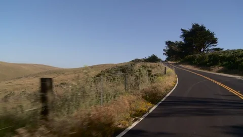 Driving down country road with camera looking back Video stock 93781276