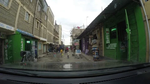 Driving down a crowded street in an urban African town Video stock 106901906