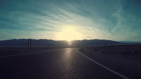 Driving Down Desert Road In Death Valley, CA Stock Footage 69873124