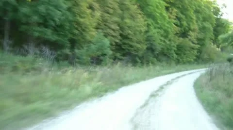 Driving Down Dirt Road Fast Video stock 12577624