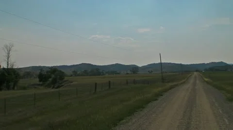 Driving down the dirt road Stock Footage 11798175