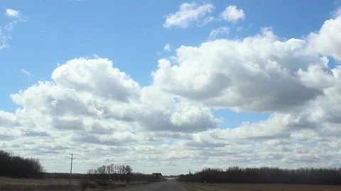 Driving down the highway looking at the clouds Stock-Footage 146665571