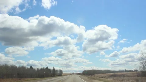 Driving down the highway looking at the clouds Stock-Footage 146665746