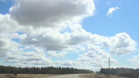 Driving down the highway looking at the clouds and pines Stock-Footage 146666260