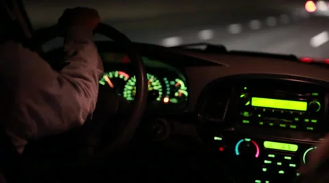 Driving down highway at night Stock Footage 32519487