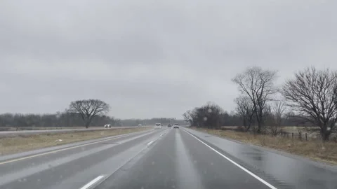 Driving Down Highway Through Windshield with Windshield Wipers Stock Footage 227074110