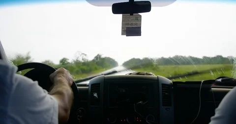 Driving down a Mexican Road while it's Raining Stock Footage 95448576
