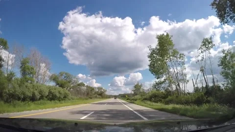 Driving Down Michigan Highway in Summer Stock Footage 232898995