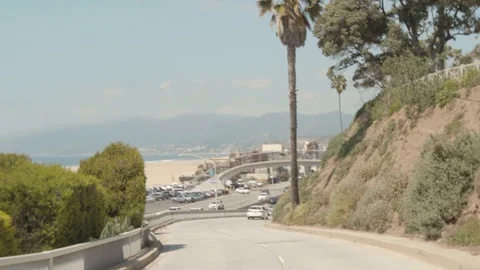 Driving down Moomat Ahiko to the PCH Stock Footage 130080271