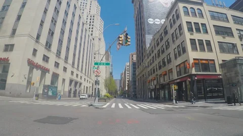 Driving down mostly empty NYC City Street - Park Ave - during Covid-19 outbreak Stock-Footage 129708937