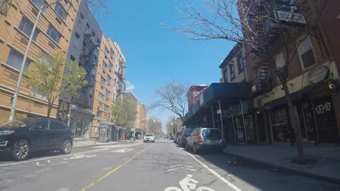 Driving down mostly empty NYC City Streets during Covid-19 outbreak Stock Footage 129716931