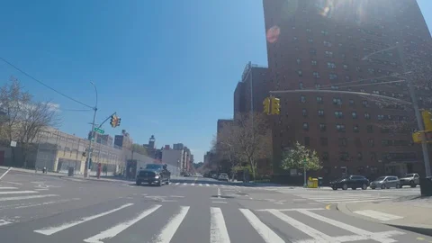 Driving down mostly empty NYC Madison Avenue during Covid-19 outbreak Stock Footage 129717210