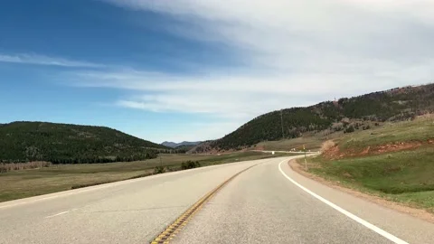 Driving down mountain highway Stock Footage 154522774