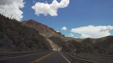 Driving Down a Mountain Road Stock Footage 51677533