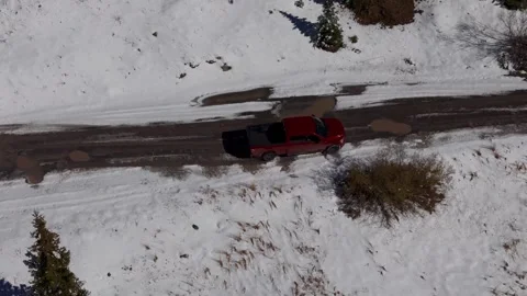 Driving down a mountain road 動画素材 305702355