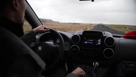 Driving down a narrow rural road in Iceland Stock Footage 306523780