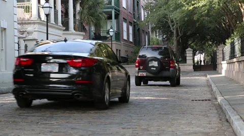 Driving down an old cobblestone road Stock Footage 45581023