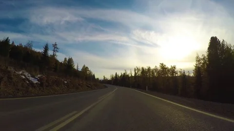 Driving down a quiet rural highway during the day in autumn. Stock Footage 82414517