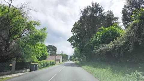 Driving Down a Quiet Suburban Road in Rural Paris France Video stock 336228993