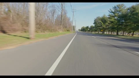 Driving down a residential road Video stock 312625579