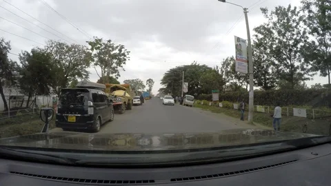 Driving down a road in Africa Video stock 106908182