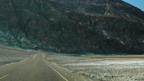 Driving down the road in Death Valley National Park, California Stock Footage 152766940