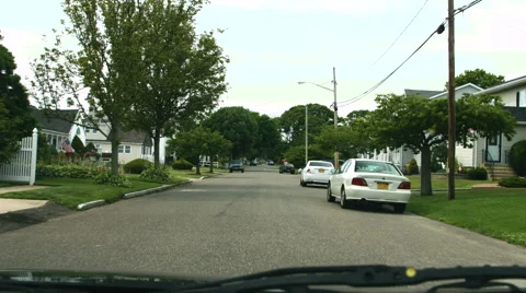 Driving down the road in long island Stock Footage 64890342