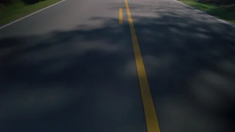 Driving Down the Road Watching the Lines Pass Stock Footage 211870289