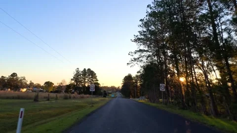 Driving Down a Rural Asphalt Road at Sunset in Australia Stock Footage 340868230