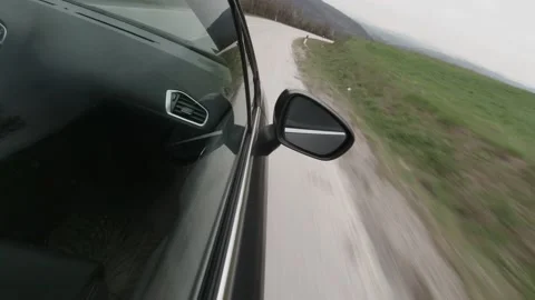 Driving down the serpentine just before rain 4K video Stock Footage 155456948