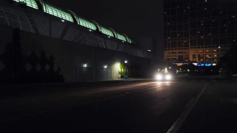 Driving down a street at night Video stock 237126693