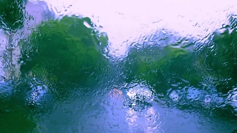 Driving Down the Street While Rain Pouring Down and Windscreen Wipers Going Past Stock Footage 325416423