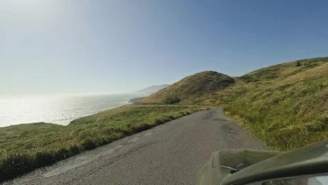 Driving down a winding coastal road in Sonoma County Stock Footage 336755320