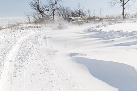 Driving in Drifting Snow Stock Photos