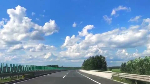 Driving driver's perspective on the Blue Sky and White Cloud Expressway Stock Footage 273476887