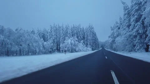 Driving from a driver's perspective on a wintry country road - Part 1 Stock Footage 273244250
