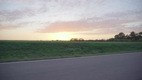 Driving during sunset field 2 Stock Footage 146652670