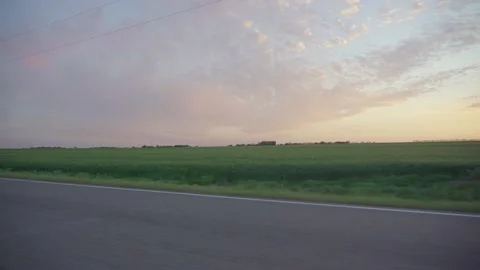 Driving during sunset field Stock Footage 146652211