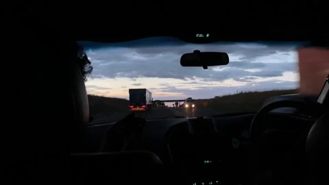 Driving at dusk Video stock 153410971