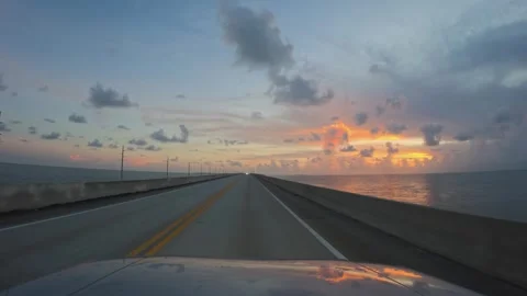 Driving Into the Dusk, Highway Over Water at Twilight, Florida Stock Footage 338314934
